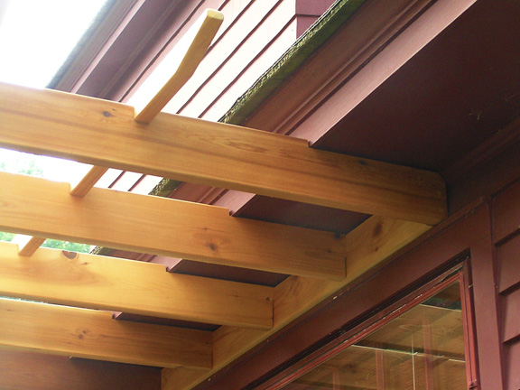 Attached cedar pergola